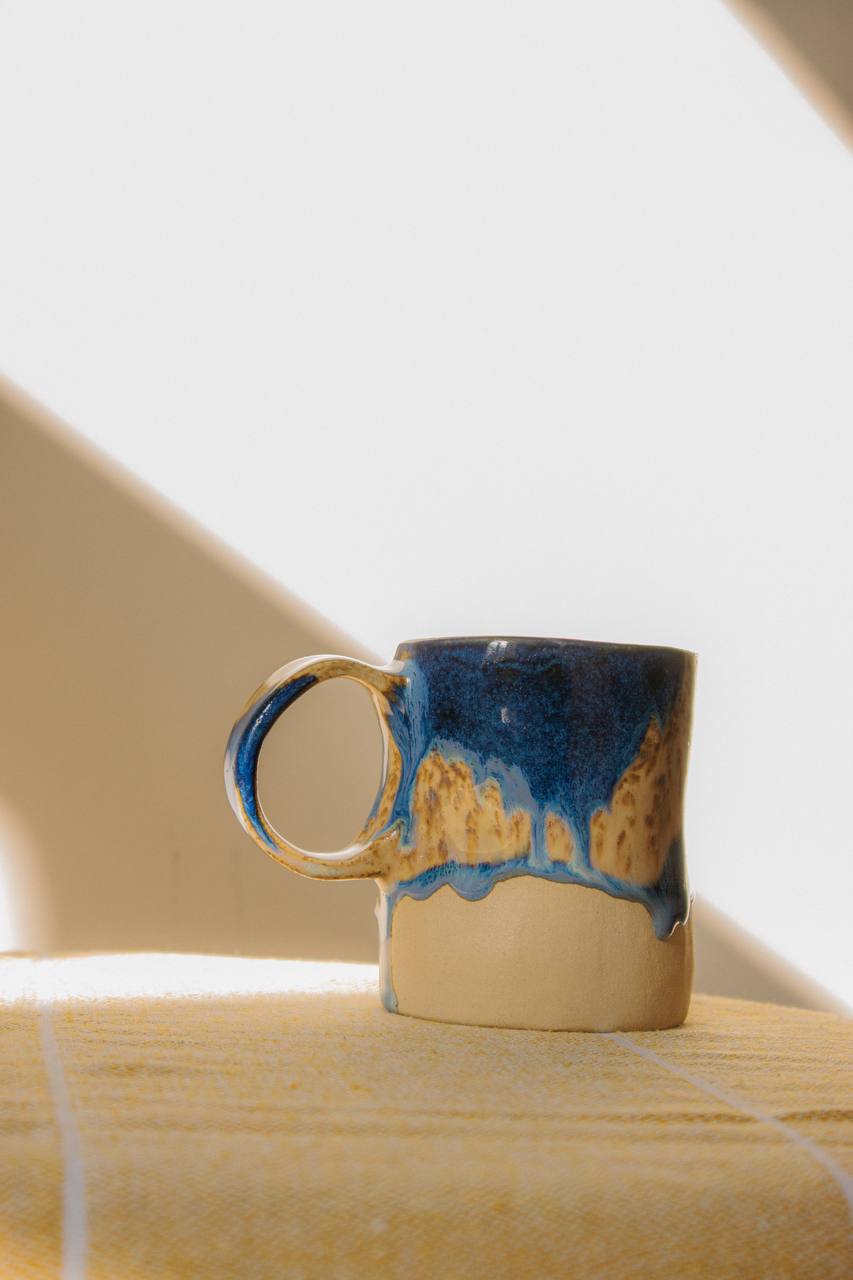 Handmade crumpled ceramic cup - "Ocean Sand", 200 ml